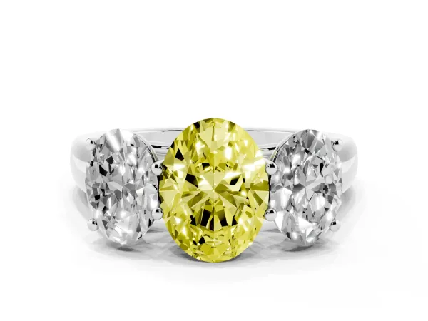 Fancy Yellow Oval Cut Three-Stone Diamond Ring with Prong Setting on a Classic Band White gold