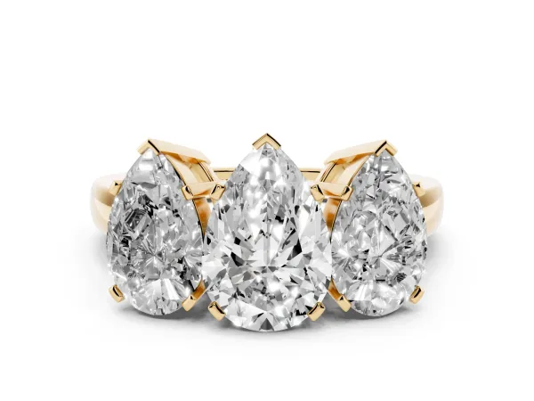 Three-Stone Pear Cut Cut Diamond Ring with Channel Set Band and Four-Prong Setting Yellow gold