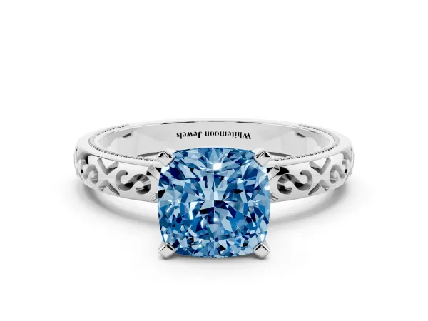 Fancy Blue Cushion Cut Solitaire Engagement Ring with Scrollwork Band and Four-Prong Setting Platinum