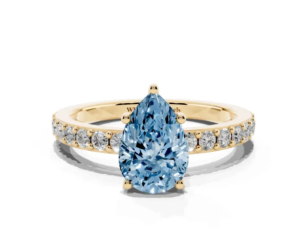 Fancy Blue Pear Cut Cut Diamond Solitaire with Pave Band and Four-Prong Setting Yellow gold