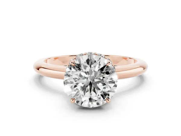Round Cut Brilliant Solitaire Engagement Ring with Six-Prong Setting and Classic Band Rose gold