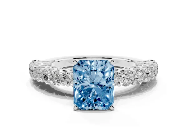 Fancy Blue Radiant Cut Diamond Solitaire Ring with Shared Prong Pavé Band and Four-Prong Setting Platinum