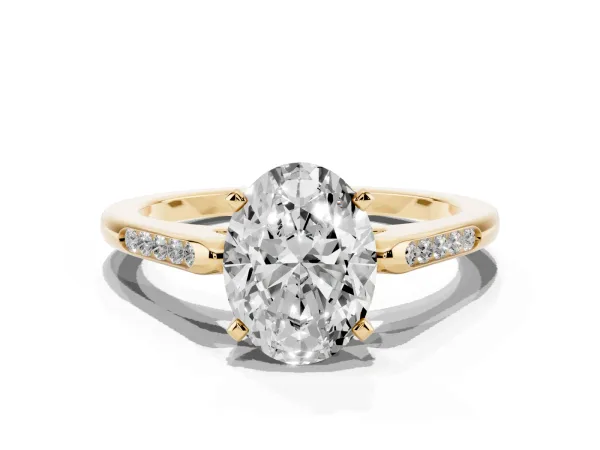 Oval Cut Diamond Solitaire Ring with Channel Set Round Band and Prong Setting Yellow gold