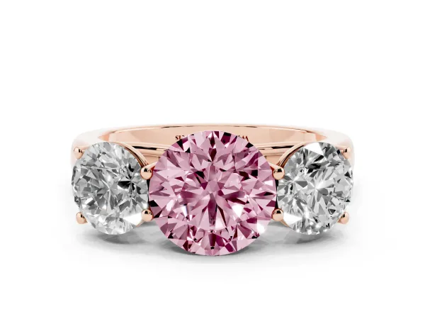 Fancy Pink Round Cut Three-Stone Diamond Ring with Prong Setting on a Classic Band Rose gold