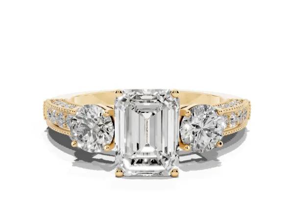 Emerald Cut Three-Stone Diamond Ring with Pavé Band and Four-Prong Setting Yellow gold