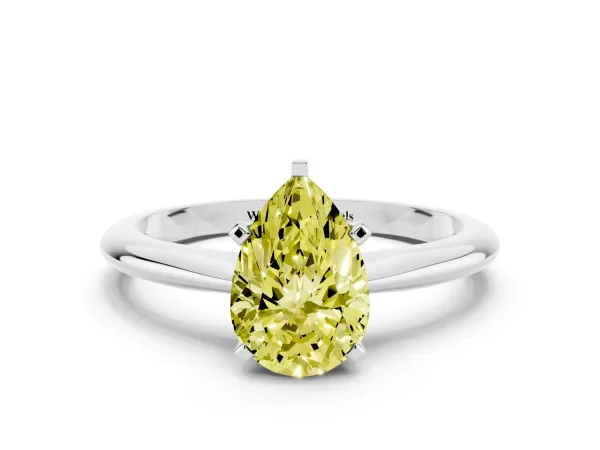 Fancy Yellow Pear Cut Cut Solitaire Ring with Four-Prong Setting on a Classic Band White gold