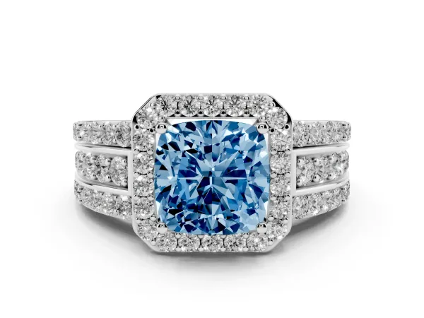 Fancy Blue Cushion Cut Halo Diamond Ring with Round Split Shank and Prong Setting White gold