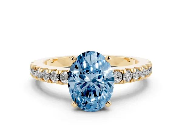 Fancy Blue Oval Cut Solitaire Diamond with Pavé Band and Four-Prong Setting Yellow gold