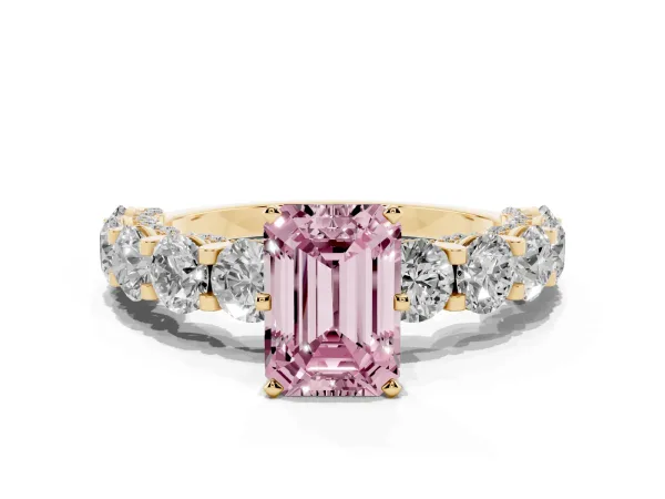Fancy Pink Emerald Cut Diamond Side Stone Engagement Ring with Four-Prong Setting Yellow gold