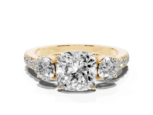 Cushion Cut Cut Diamond Three-Stone Ring with Round Side Stones and Pavé Band Yellow gold