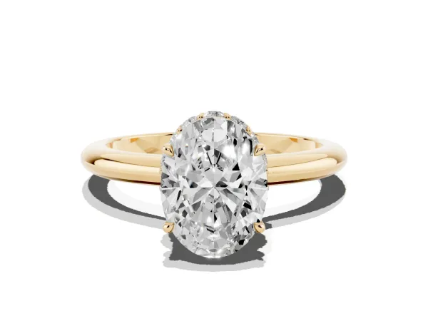 Oval Cut Brilliant Solitaire Engagement Ring with Six-Prong Setting and Classic Band Yellow gold