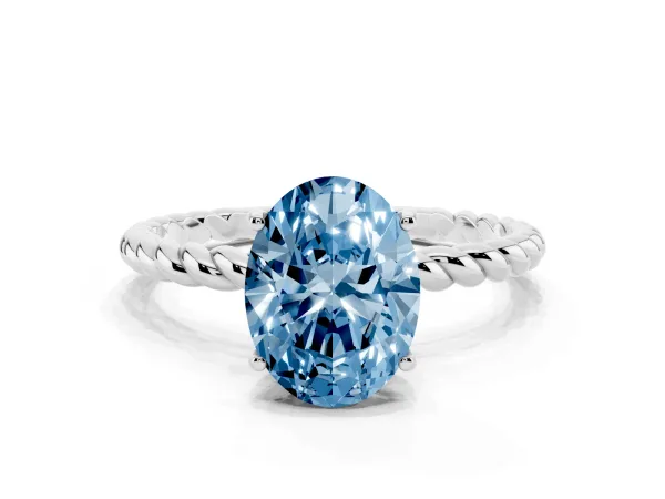 Fancy Blue Oval Cut Solitaire Twist Band Ring with Four-Prong Setting Platinum