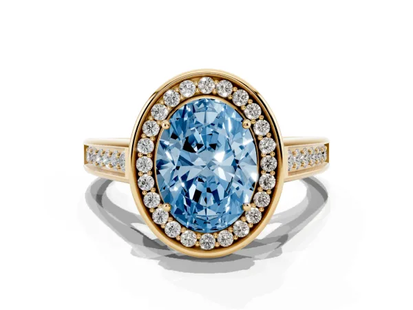Fancy Blue Oval Cut Halo Solitaire Diamond Ring with Pave Band and Bezel Setting Yellow gold
