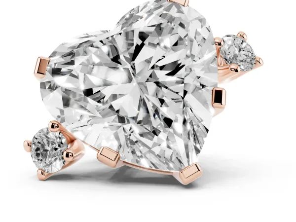 Heart Cut Cut Three-Stone Solitaire Ring with Round Accent Diamonds and Four-Prong Setting Rose gold