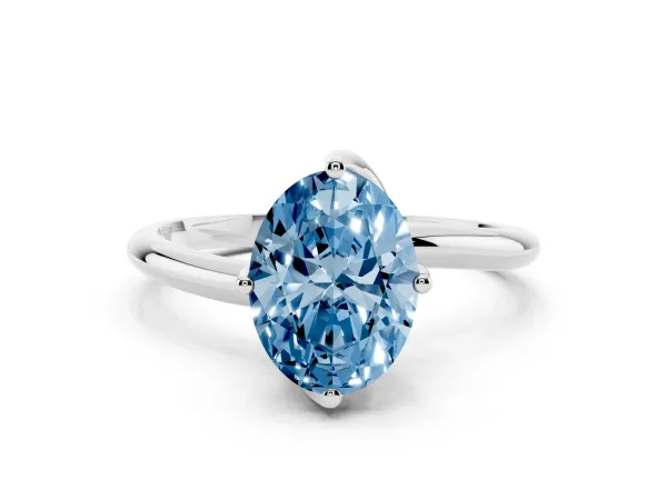 Fancy Blue Oval Cut Diamond Solitaire Engagement Ring with Four-Prong Setting and Classic Band Platinum
