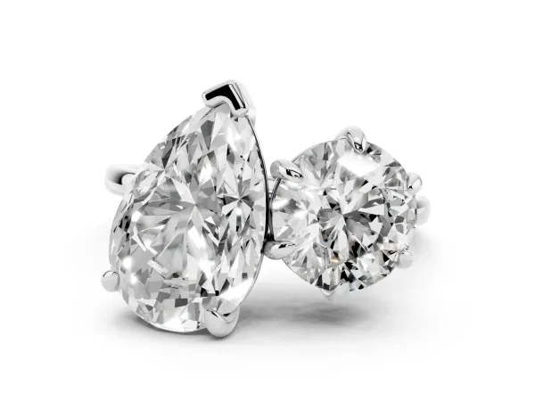 Round and Pear Toi Moi Ring with Prong Setting and Plain Band Platinum