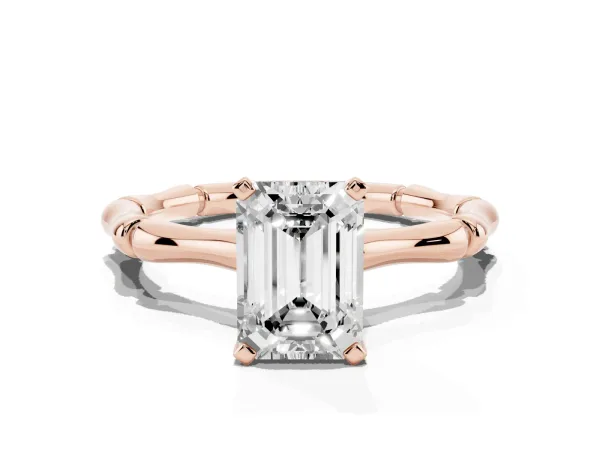 Emerald Cut Solitaire Diamond Ring with Bamboo Band and Four-Prong Setting Rose gold