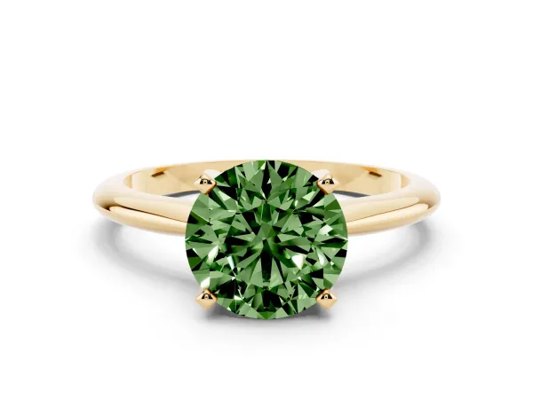 Fancy Green Round Cut Cut Solitaire Ring with Four-Prong Setting on a Classic Band Yellow gold