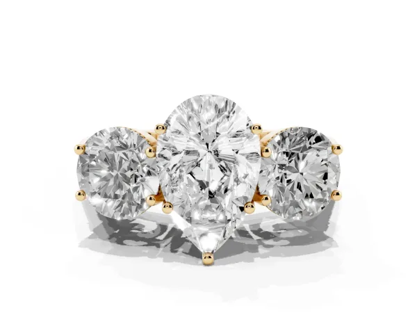 Three-Stone Pear Cut Diamond Engagement Ring with Prong Setting on a Classic Band Yellow gold