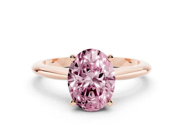 Fancy Pink Oval Cut Cut Solitaire Ring with Four-Prong Setting on a Classic Band Rose gold