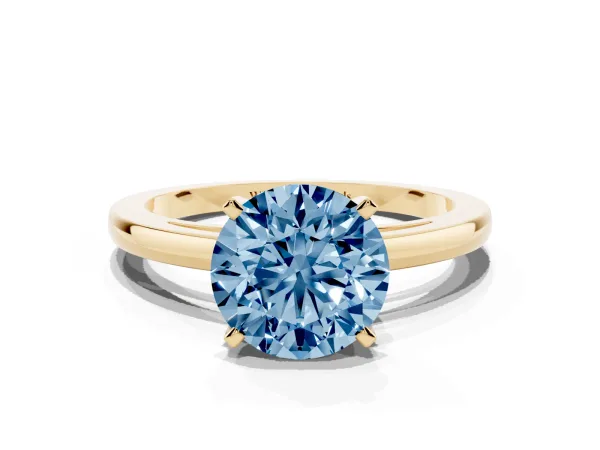 Fancy Blue Round Cut Solitaire Diamond Engagement Ring with Four-Prong Setting on a Classic Band Yellow gold