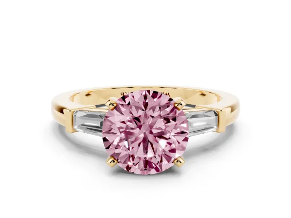 Fancy Pink Round Cut Cut Diamond Solitaire Ring with Tapered Baguette Accents and Four-Prong Setting Yellow gold