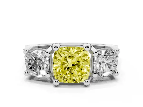 Fancy Yellow Cushion Cut Diamond Three-Stone Ring with Channel Set Band and Four-Prong Setting Platinum