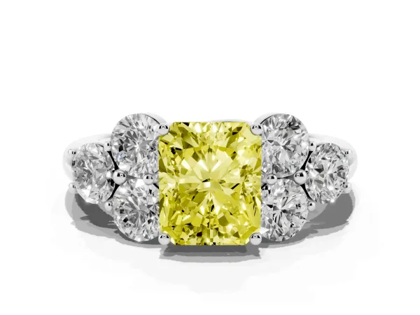 Fancy Yellow Radiant Cut Cut Diamond Cluster Ring with Round Accent Stones and Prong Setting on a Classic Band Platinum