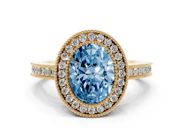Fancy Blue Oval Cut Cut Halo Diamond Ring with Pavé Band and Milgrain Prong Setting Yellow gold
