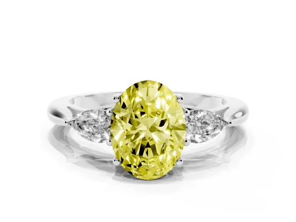 Fancy Yellow Three-Stone Oval Cut Brilliant Diamond Solitaire Ring with Tapered Band and Four-Prong Setting Platinum