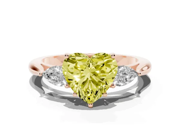 Fancy Yellow Three-Stone Heart Cut Brilliant Diamond Solitaire Ring with Tapered Band and Four-Prong Setting Rose gold