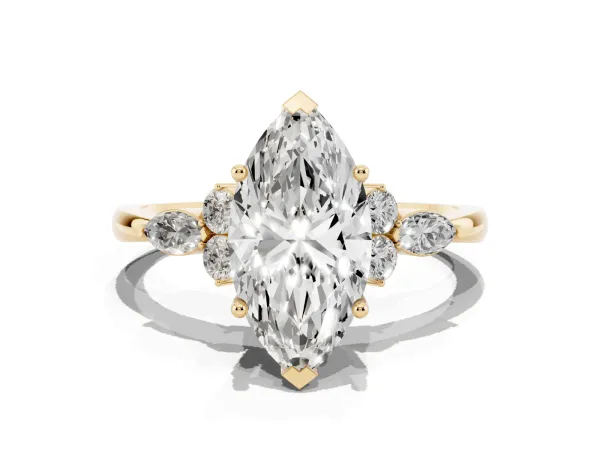 Marquise Cut Brilliant Diamond Solitaire Ring with Pear Side Stones and Four-Prong Setting Yellow gold