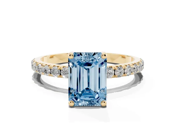 Fancy Blue Emerald Cut Cut Diamond Solitaire Ring with Micro Pave Band and Four Prong Setting Yellow gold