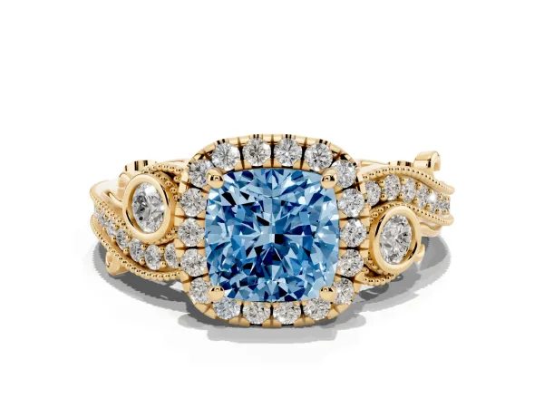 Fancy Blue Cushion Cut Halo Diamond Ring with Milgrain and Bezel Accents on a Split Shank Band Yellow gold