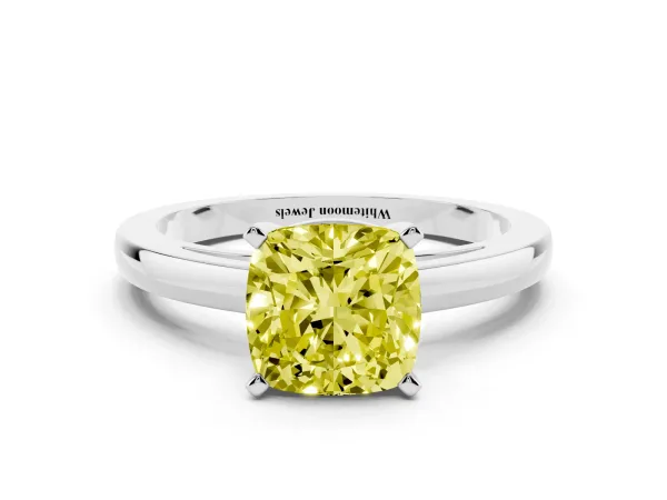 Fancy Yellow Cushion Cut Solitaire Diamond Engagement Ring with Four-Prong Setting on a Classic Band Platinum
