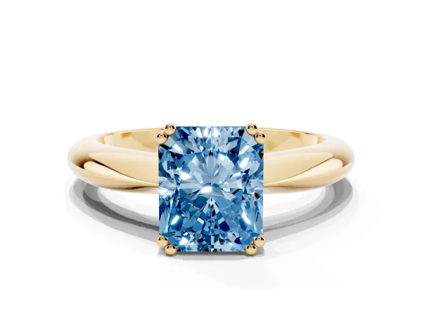 Fancy Blue Radiant Cut Cut Solitaire Engagement Ring with Tapered Band and Four-Prong Setting Yellow gold