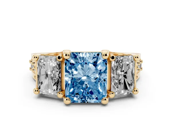 Fancy Blue Radiant Cut Diamond Three-Stone Ring with Channel Set Band and Four-Prong Setting Yellow gold