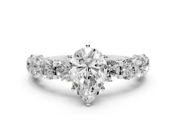 Pear Cut Diamond Side Stone Engagement Ring with Four-Prong Setting Platinum