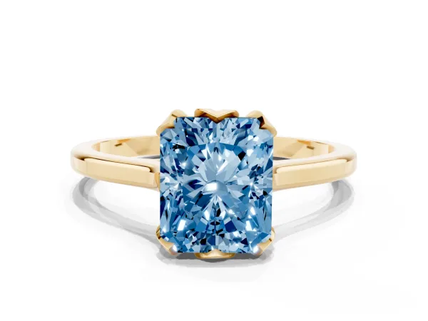Fancy Blue Radiant Cut Diamond Solitaire Ring with Flower Prong Setting and Classic Band Yellow gold