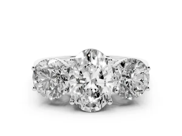 Three-Stone Oval Cut Diamond Engagement Ring with Prong Setting on a Classic Band Platinum
