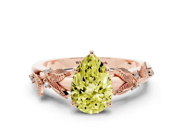 Fancy Yellow Pear Cut Diamond Solitaire Ring with Leaf Motif Band and Four-Prong Setting Rose gold