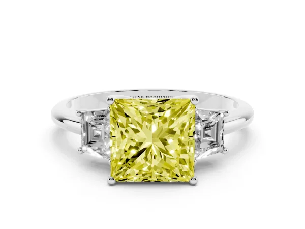 Fancy Yellow Princess Cut Diamond Three-Stone Ring with Trapezoid Side Stones and Prong Setting Platinum