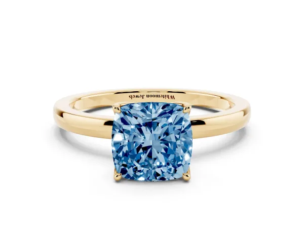 Fancy Blue Cushion Cut Diamond Solitaire Ring with Thin Band and Prong Setting Yellow gold