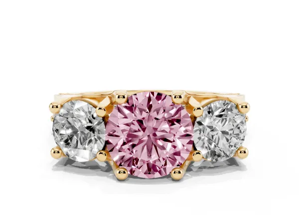 Fancy Pink Round Cut Diamond Three-Stone Ring with Channel Set Band and Four-Prong Setting Yellow gold