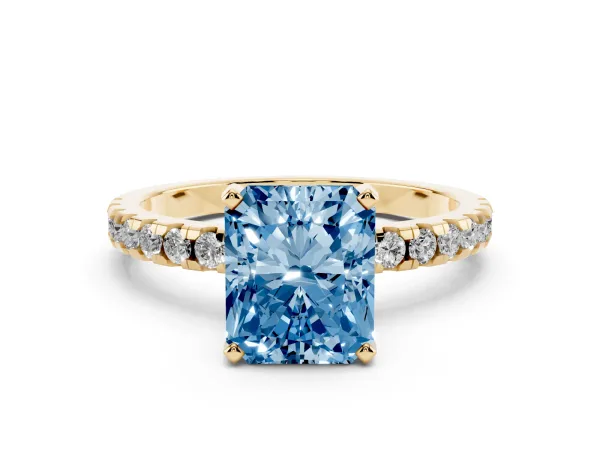 Fancy Blue Radiant Cut Diamond Solitaire Ring with Round Pavé Band and Four-Prong Setting Yellow gold