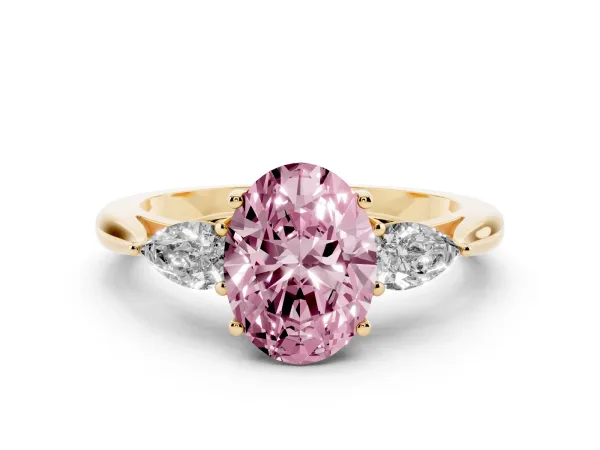Fancy Pink Three-Stone Oval Cut Diamond Ring with Pear Side Stones in Four-Prong Setting Yellow gold