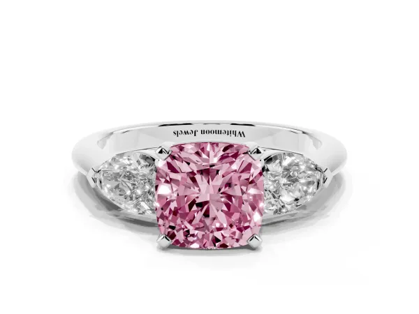 Fancy Pink Three-Stone Cushion Cut Diamond Ring with Pear Side Stones and Four-Prong Setting Platinum