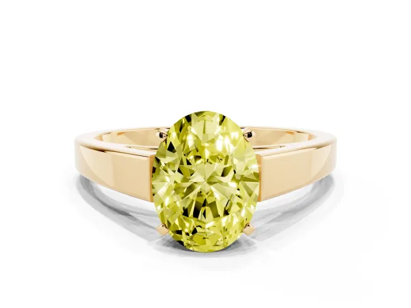 Fancy Yellow Oval Cut Solitaire Engagement Ring with Four-Prong Setting and Tapered Band Yellow gold