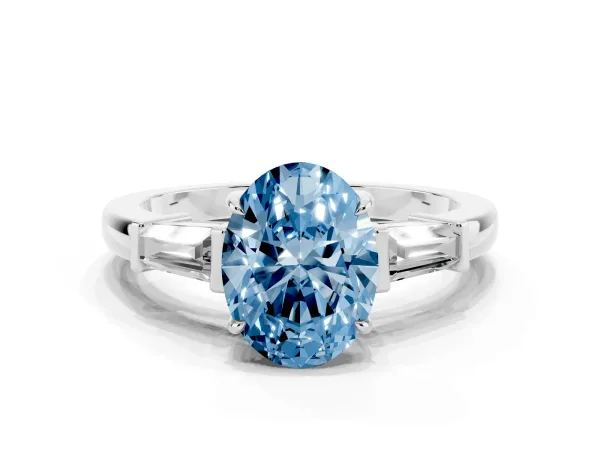 Fancy Blue Oval Cut Diamond Three-Stone Ring with Tapered Baguette Side Stones and Prong Setting Platinum