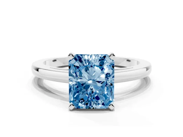 Fancy Blue Radiant Cut Solitaire Diamond Engagement Ring with Four-Prong Setting on a Classic Band White gold